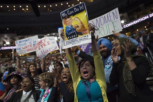 Delegates cheer during Day three of the Democratic National Convention at Wells Fargo Center in Philadelphia, Pennsylvania on July 27, 2016. Hillary Clinton claims the Democratic Party\