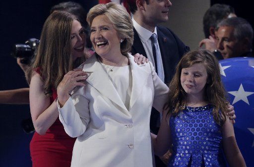 Democratic nominee for President Hillary Clinton and daughter Chelsea Clinton celebrate at the conclusion of day four of the Democratic National Convention at Wells Fargo Center in Philadelphia, Pennsylvania on July 28, 2016. Hillary Clinton ...