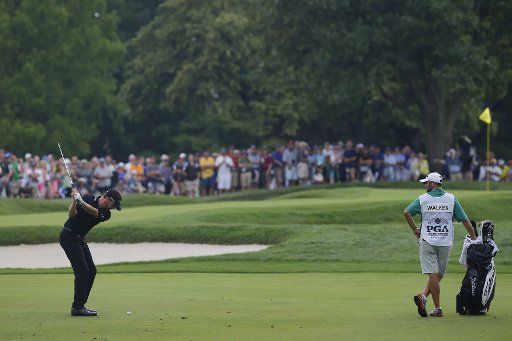 Jimmy Walker hits his 3rd shot to the 17th green in the final round at the PGA Championship at Baltusrol Golf Club in Springfield, New Jersey on July 31, 2016. Walker won the championship and his first major with a score of 14 under par. Photo ...