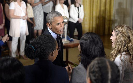 President Barack Obama greets some guests during an event in the East Room of the White House to honor the 2015 WNBA Champions, the Minnesota Lynx for their WNBA championship victory on June 27, 2016 in Washington, D.C. Photo by Olivier Douliery\/