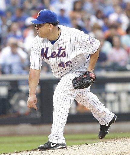New York Mets starting pitcher Bartolo Colon throws a pitch in the 2nd inning against the Washington Nationals at Citi Field in New York City on July 7, 2016. Photo by John Angelillo\/