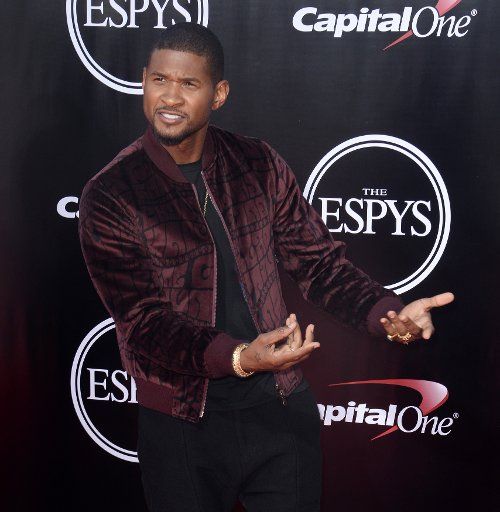 Singer Usher attends the ESPY Awards at Microsoft Theater in Los Angeles on July 13, 2016. Photo by Jim Ruymen\/
