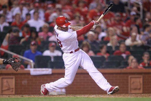St. Louis Cardinals Tommy Pham swings hitting a single in the ninth inning against the Miami Marlins at Busch Stadium in St. Louis on July 15, 2016. Pham had two home runs and a single as Miami defeated St. Louis 7-6. Photo by Bill Greenblatt\/