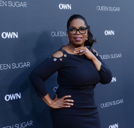 Producer Oprah Winfrey attends the premiere of OWN\