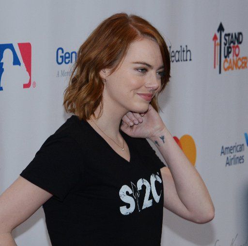 Actress Emma Stone attends the 5th biennial Stand Up To Cancer televised fundraising event at the Walt Disney Concert Hall in Los Angeles on September 9, 2016. Photo by Jim Ruymen\/