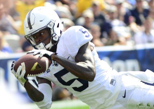 Penn State Nittany Lions wide receiver DaeSean Hamilton (5) makes a diving catch along the sidelines in the fourth quarter of Pittsburgh Panthers 42 - 39 win over Penn State at Heinz Field in Pittsburgh on September 10 , 2016. Photo by Archie ...