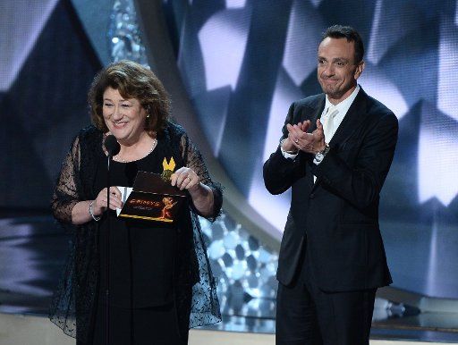 Actors Margo Martindale and Hank Azaria speak onstage during the 68th annual Primetime Emmy Awards at Microsoft Theater in Los Angeles on September 18, 2016. Photo by Jim Ruymen\/