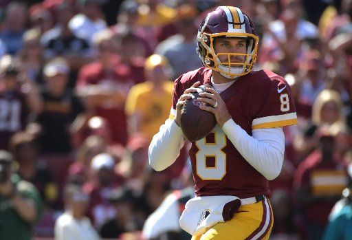 Washington Redskins quarterback Kirk Cousins (8) looks to pass against the Philadelphia Eagles in the first quarter at FedEx Field in Landover, Maryland on October 16, 2016. Photo by Kevin Dietsch\/