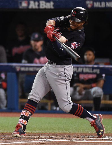 Cleveland Indians shortstop Francisco Lindor singles during the first inning against the Toronto Blue Jays in game five of the American League Championship Series at Rogers Centre on October 19, 2016. Cleveland leads the series 3-1 over Toronto. ...