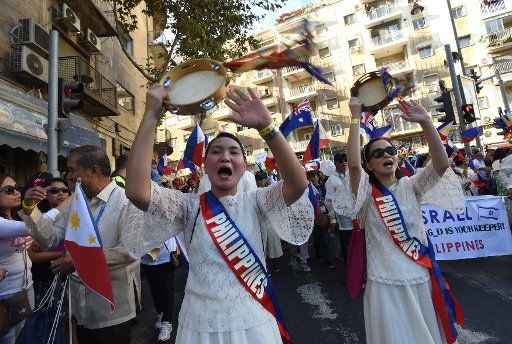 Evangelical Christians from the Philippines march in the annual Jerusalem Parade to mark the Jewish holiday of Sukkot, Feast of Tabernacles, in Jerusalem, Israel, October 20, 2016. Thousands of Christians from around the world marched with Israeli ...