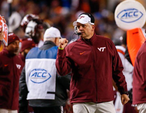 Virginia Tech Hokies head coach Justin Fuente applauds his offense in the fourth quarter in Pittsburgh on October 27, 2016. Photo by Matt Durisko\/