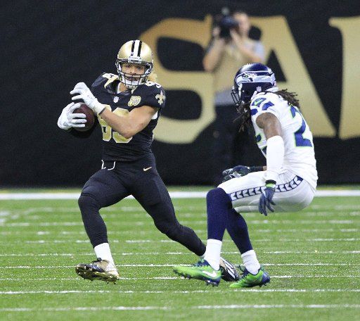 New Orleans Saints wide receiver Willie Snead (83) takes a Drew Brees pass 16 yards before being tackled by Seattle Seahawks cornerback Richard Sherman (25) at the Mercedes-Benz Superdome in New Orleans October 30, 2016. Photo by AJ Sisco\/