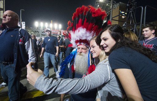 Fans taking selfies before game 6 of the World Series as the Cleveland Indians face the Chicago Cubs at Progressive Field in Cleveland, Ohio on November 1, 2016. Cubs tied the series with the Indians 3-3. Photo by Kyle Lanzer\/
