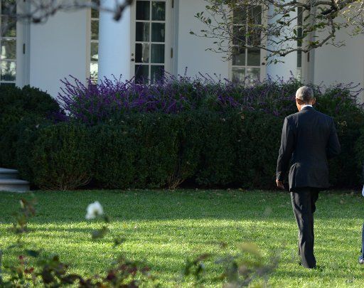 U.S. President Barack Obama walks back to the Oval Office after he honored the 2016 NBA Champions Cleveland Cavaliers on the South Lawn of the White House in Washington, DC on November 10, 2016. Photo by Pat Benic\/