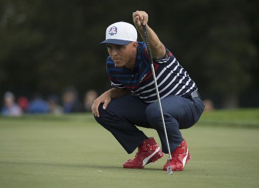USA Team member Rickie Fowler lines up a putt on the 11th hole during a practice round prior to the 2016 Ryder Cup at Hazeltine National Golf Club in Chaska, Minnesota on September 29, 2016. Photo by Kevin Dietsch\/