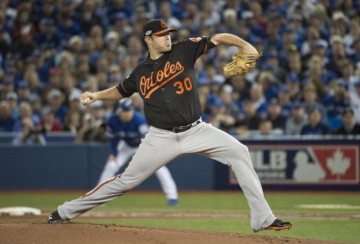 Baltimore Orioles pitcher Chris Tillman pitches against the Toronto Blue Jays in the first inning of the wild card game at the Rogers Centre in Toronto, Canada on Tuesday, October 4, 2016. Photo by Darren Calabrese\/