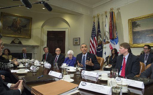 U.S. President Barack Obama makes comments after meeting with financial regulators and advisers in the Roosevelt Room of the White House in Washington, DC on March 7, 2016. Obama said the that the regulations and Wall Street reforms are working ...