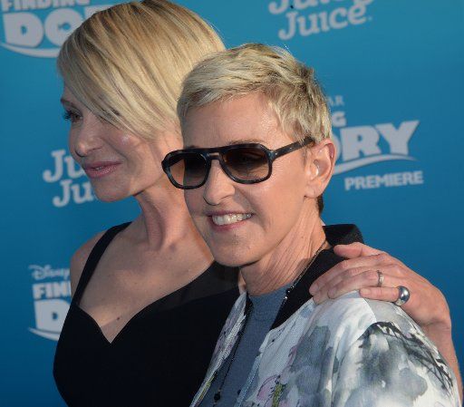 Cast member Ellen DeGeneres (R), the voice of Dory and her spouse, actress Portia de Rossi attend the premiere of the animated motion picture comedy "Finding Dory" at the El Capitan Theatre in the Hollywood section of Los Angeles on June 8, 2016. ...
