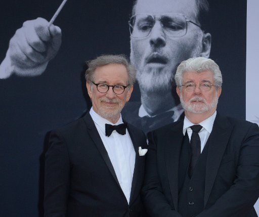 Directors Steven Spielberg (L) and George Lucas attend American Film Institutes\