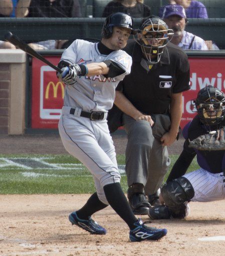 Miami Marlins outfielder Ichiro Suzuki hits a triple in the seventh inning to notch his 3,000 career hit at Coors Field in Denver on August 7, 2016. Ichiro becomes the 30th player in Major League history to record 3,000 hits. Photo by Gary C. Caskey\/...