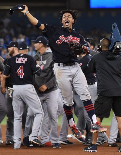 Cleveland Indians shortstop Francisco Lindor leaps celebrating beating the Toronto Blue Jays in game five of the American League Championship Series at Rogers Centre on October 19, 2016. Cleveland defeated Toronto 3-0 to capture the American League ...