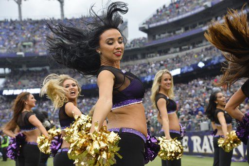 Baltimore Ravens cheerleaders perform against the Philadelphia Eagles during the second half of an NFL game at M&T Bank Stadium in Baltimore, Maryland, December 18, 2016. Baltimore won 27-26. Photo by David Tulis\/
