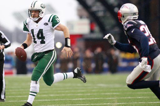 New York Jets quarterback Ryan Fitzpatrick (14) scrambles in the second quarter against the New England Patriots at Gillette Stadium in Foxborough, Massachusetts on December 24, 2016. The Patriots defeated the Jets 41-3. Photo by Matthew Healey\/ ...