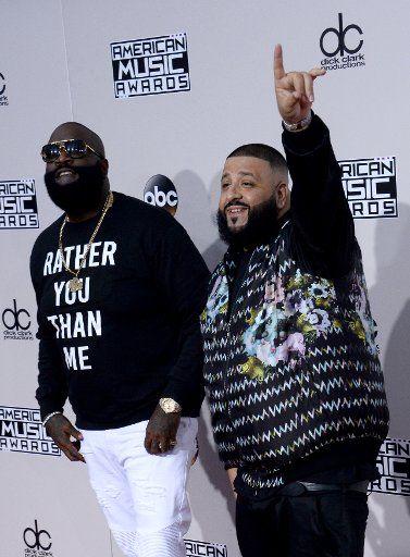 (L-R) Rick Ross, DJ Khaled arrive for the 2016 American Music Awards held at Microsoft Theater in Los Angeles on November 20, 2016. Photo by Jim Ruymen\/
