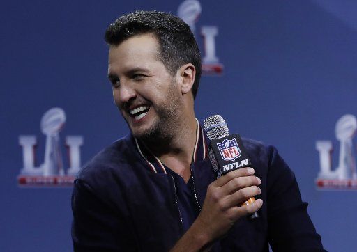 Luke Bryan speaks at the Super Bowl LI Pregame Show Press Conference prior to Super Bowl LI at the George R. Brown Convention Center in Houston, Texas on February 2, 2017. The New England Patriots will play the Atlanta Falcons in Super Bowl LI on ...