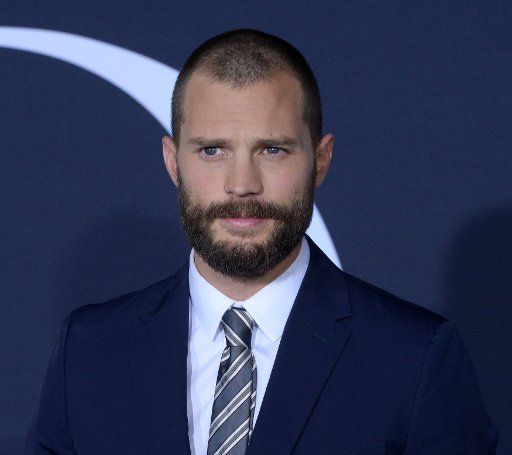 Cast member Jamie Dornan attends the "Fifty Shades Darker" premiere at the Ace Hotel Theatre in Los Angeles on February 2, 2017. Storyline: While Christian wrestles with his inner demons, Anastasia must confront the anger and envy of the women who ...