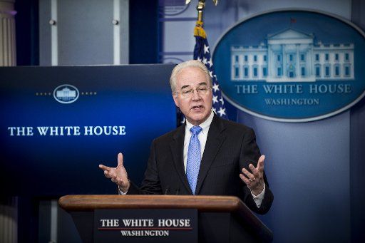 Press Secretary Sean Spicer looks on as Health and Human Services Secretary Tom Price answers questions during a press conference in the Brady Press Briefing Room at the White House in Washington, DC on February 22, 2017. Photo by Pete Marovich\/...