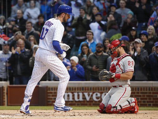 Chicago Cubs Kris Bryant crosses the home plate after hitting a solo home off Philadelphia Phillies starting pitcher Jeremy Hellickson during the first inning at Wrigley Field on May 2, 2017 in Chicago. Photo by Kamil Krzaczynski\/