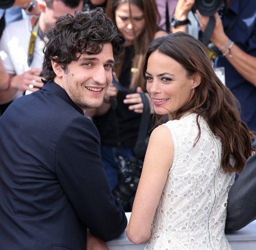 Louis Garrel (L) and Berenice Bejo and arrive at a photocall for the film "Le redoutable" during the 70th annual Cannes International Film Festival in Cannes, France on May 21, 2017. Photo by David Silpa\/
