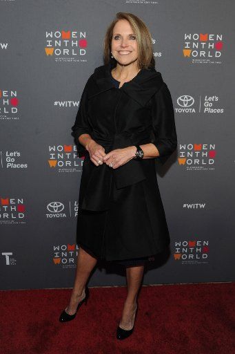 Katie Couric arrives on the red carpet at Tina Brown\