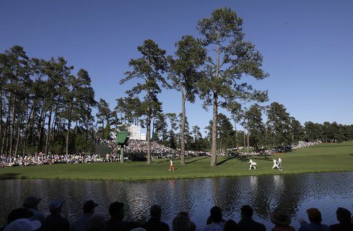 Rory McIlroy of Norther England walks to the 16th green in the third round at the 2017 Masters Tournament at Augusta National Golf Club in Augusta, Georgia on April 8, 2017. Photo by John Angelillo\/