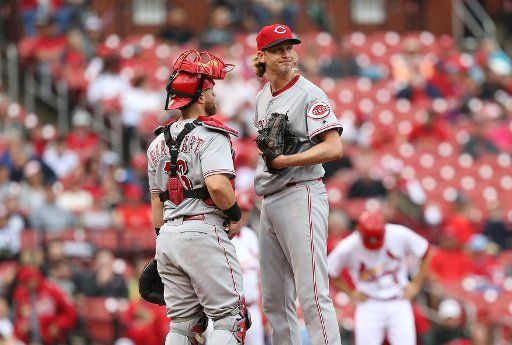 Cincinnati Reds catcher Tucker Barnhart talks with starting pitcher Bronson Arroyo in the fifth inning after giving up three runs to the St. Louis Cardinals at Busch Stadium in St. Louis on April 30, 2017. Cincinnati won the game 5-4. Photo by Bill ...