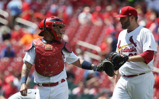 St. Louis Cardinals Lance Lynn is congratulated by catcher Yadier Molina after getting out of a bases loaded fifth inning against the Milwaukee Brewers at Busch Stadium in St. Louis on June 13, 2017. St. Louis defeated MIlwaukee 6-0. Photo by Bill ...