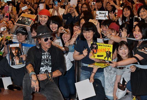 Actor Johnny Depp arrives at Tokyo International Airport in Tokyo, Japan, on June 20, 2017. Photo by Keizo Mori\/