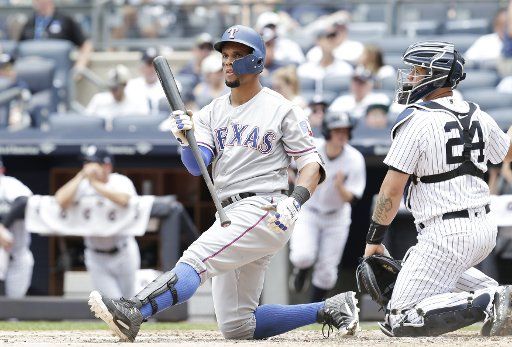 Texas Rangers Carlos Gomez takes a swing in the 3rd inning against the New York Yankees at Yankee Stadium in New York City on June 25, 2017. Photo by John Angelillo\/