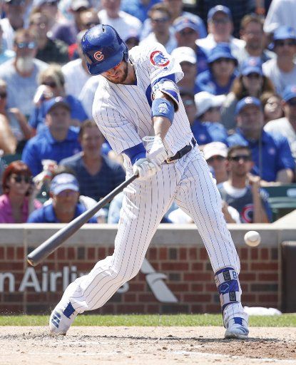 Chicago Cubs Kris Bryant hits an RBI single against the Milwaukee Brewers in the third inning at Wrigley Field on July 6, 2017 in Chicago. Photo by Kamil Krzaczynski\/