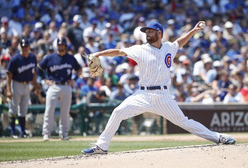 Chicago Cubs Jack Leathersich delivers against the Milwaukee Brewers in the third inning at Wrigley Field on July 6, 2017 in Chicago. Photo by Kamil Krzaczynski\/