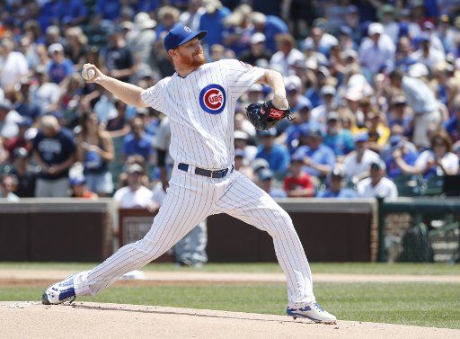 Chicago Cubs starting pitcher Eddie Butler delivers against the Pittsburgh Pirates in the first inning at Wrigley Field on July 7, 2017 in Chicago. Photo by Kamil Krzaczynski\/
