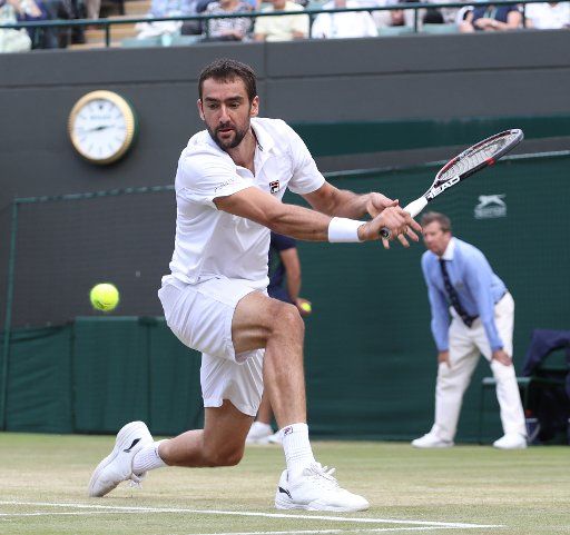 Croat Marin Cilic returns the ball in his match against Luxembourg\