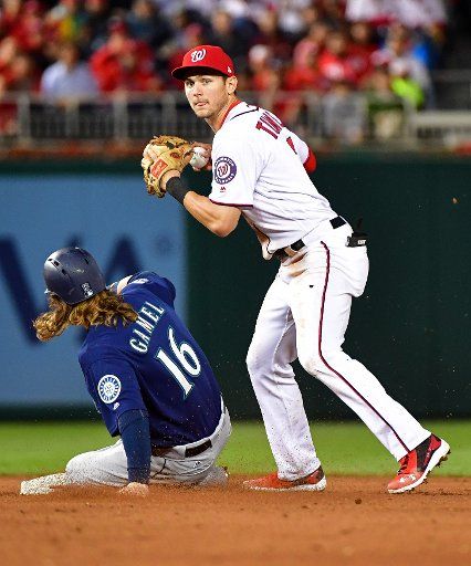 Washington Nationals shortstop Trea Turner (7) forces out Seattle Mariners right fielder Ben Gamel (16) at Nationals Park in Washington, D.C. on May 24, 2017. Photo by Kevin Dietsch\/