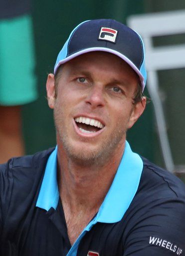 American Sam Querrey paused during his French Open men\