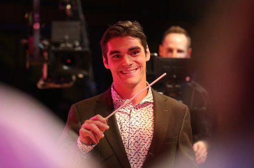 Actor RJ Mitte of Breaking Bad fame, conducts a childrens choir during the taping of Shriners Hospitals network holiday commercials in St. Louis on August 9, 2017. Photo by Bill Greenblatt\/