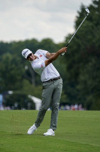 Adam Scott hits his second shot on the ninth fairway during the first round of the 2017 PGA Championship at the Quail Hollow Club in Charlotte, North Carolina on August 10, 2017. Photo by Nell Redmond\/