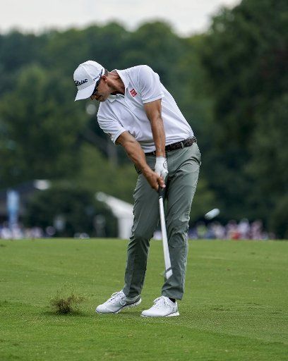 Adam Scott hits his second shot on the ninth fairway during the first round of the 2017 PGA Championship at the Quail Hollow Club in Charlotte, North Carolina on August 10, 2017. Photo by Nell Redmond\/