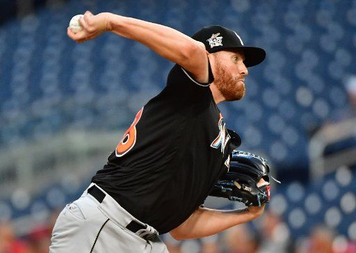Miami Marlins starting pitcher Dan Straily (58) pitches against the Washington Nationals in the first inning at Nationals Park in Washington, D.C. on August 10, 2017. Photo by Kevin Dietsch\/