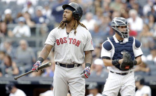Boston Red Sox Hanley Ramirez reacts after striking out in the first inning against the New York Yankees at Yankee Stadium in New York City on August 12, 2017. Photo by John Angelillo\/